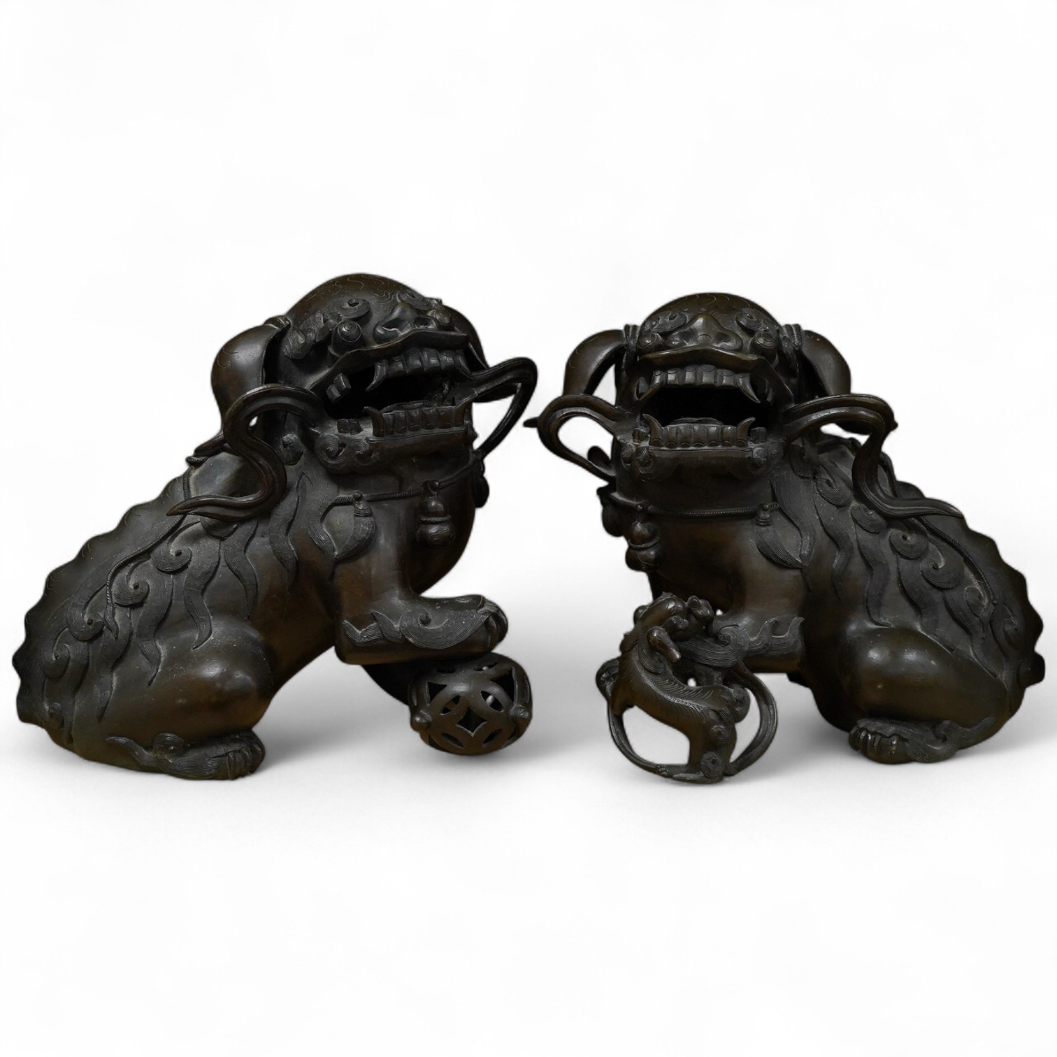 A pair of large 19th century Chinese bronze lion dogs, 26cm